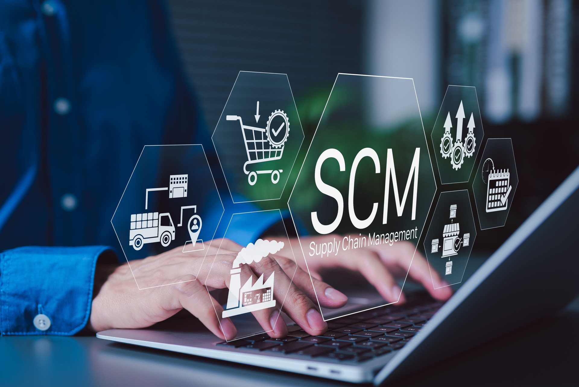 SCM, Supply Chain Management and Logistics System Concept. Person working on laptop with icons representing supply chain management, logistics, procurement, inventory, distribution, manufacturing processes